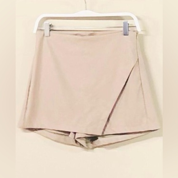 (16332-BGE) PU SKORT SHORTS WITH OVERLAPPING ASYMMETRICAL PANEL - Picture 1 of 5